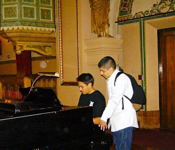 Puente students playing piano in Santa Clara University Chapel